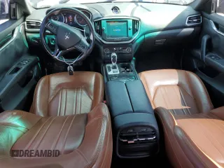 2016 Maserati Ghibli z VIN ZAM57XSAXG1174741, wystawiony jako Copart lot #51975655 z przebiegiem 127 182 mil mil oraz Tytuł czysty. Historia ofert i sprzedaży dostępna na DreamBid. Obrazek 8.