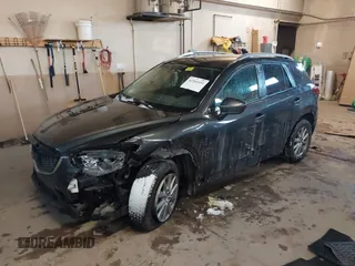 2015 Mazda CX-5 Touring with VIN JM3KE2CY2F0458114, listed as a IAAI auction lot 41545493 with 138,061 mi miles. Bid and sale history available at carsss.com. Image 2.
