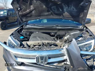 2021 Honda Pilot EX-L with VIN 5FNYF6H54MB028203, listed as a IAAI auction lot 41641116 with 46,755 mi miles and . Bid and sale history available at DreamBid. Image 10.
