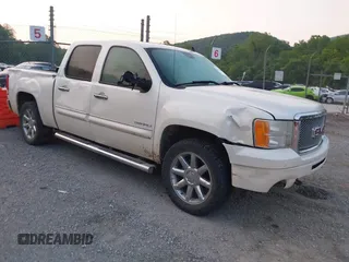 2013 GMC Sierra 1500 Denali z VIN 3GTP2XE25DG225253, wystawiony jako IAAI lot #42426350 z przebiegiem 212 501 mil mil oraz . Historia ofert i sprzedaży dostępna na DreamBid. Obrazek 1.