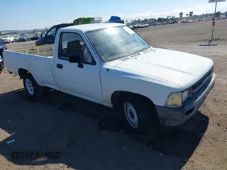 1991 Toyota Pickup DLX with VIN JT4RN82P1M5037018, listed as a IAAI auction lot 42754306 with 107,887 mi miles and . Bid and sale history available at DreamBid. Image 1.