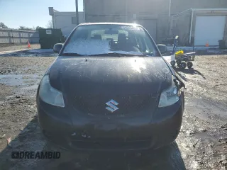 2012 Suzuki SX4 LE with VIN JS2YC5A3XC6303083, listed as a Copart auction lot 89265635 with 155,316 mi miles and Salvage Title. Bid and sale history available at carsss.com. Image 5.