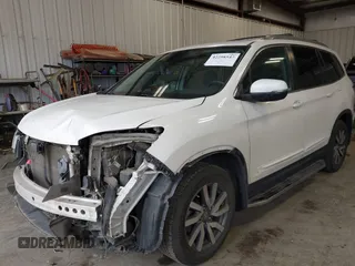 2019 Honda Pilot EX-L with VIN 5FNYF6H54KB043295, listed as a IAAI auction lot 42298547 with 235,343 mi miles and . Bid and sale history available at DreamBid. Image 2.