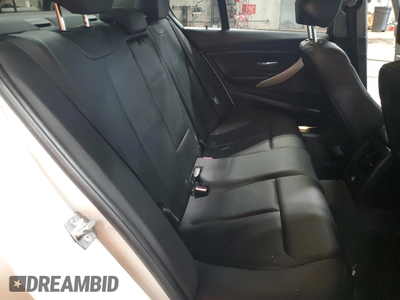 2013 BMW 3 Series 320i xDrive with VIN WBA3C3C5XDF982732, listed as a Copart auction lot 62852385 with 134,466 mi miles and Salvage title. Bid and sale history available at DreamBid. Image 10.