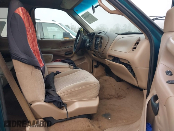 1998 Ford F-150 with VIN 1FTZX17W5WNC39090, listed as a IAAI auction lot 41496618 with 304,238 mi miles and . Bid and sale history available at DreamBid. Image 5.