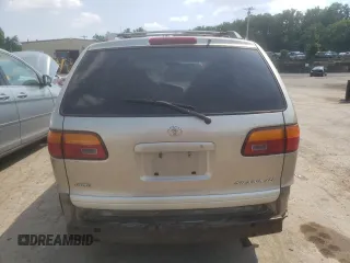 2000 Toyota Sienna LE with VIN 4T3ZF13C8YU219698, listed as a Copart auction lot 59733984 with 305,061 mi miles and Salvage Title. Bid and sale history available at carsss.com. Image 7.