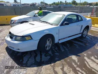 2002 Ford Mustang Standard with VIN 1FAFP40462F119838, listed as a IAAI auction lot 42801101 with Not provided miles and . Bid and sale history available at DreamBid. Image 2.