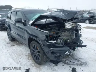 2018 Jeep Grand Cherokee Laredo E with VIN 1C4RJFAG0JC203148, listed as a IAAI auction lot 41614678 with 118,500 mi miles. Bid and sale history available at carsss.com. Image 1.