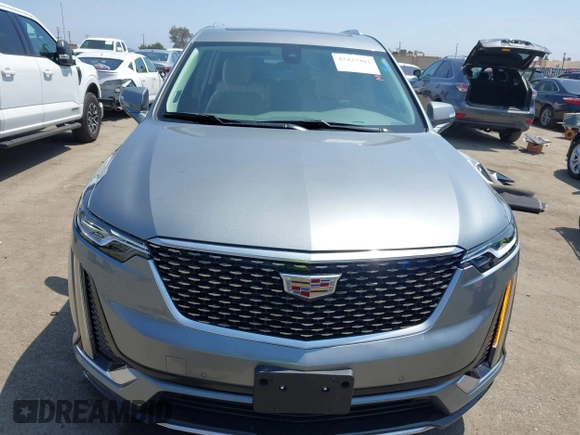 2023 Cadillac XT6 FWD Premium Luxury with VIN 1GYKPCRS6PZ163018, listed as a IAAI auction lot 42437403 with 21,366 mi miles and . Bid and sale history available at DreamBid. Image 13.