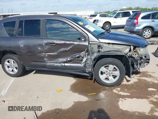 2016 Jeep Compass Latitude z VIN 1C4NJCEA2GD665636, wystawiony jako IAAI lot #42054222 z przebiegiem 155 071 mil mil oraz . Historia ofert i sprzedaży dostępna na DreamBid. Obrazek 19.