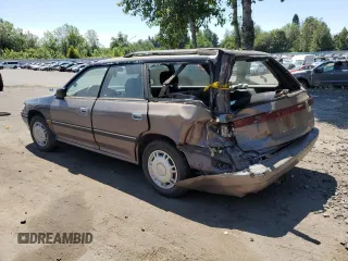 1993 Subaru Legacy L with VIN 4S3BJ6339P6948161, listed as a Copart auction lot 63123584 with 329,619 mi miles and Salvage Title. Bid and sale history available at DreamBid. Image 2.