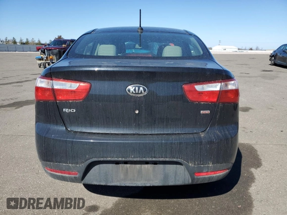 2015 Kia Rio LX with VIN KNADM4A37F6497167, listed as a Copart auction lot 49968245 with 98,517 mi miles and Salvage Title. Bid and sale history available at carsss.com. Image 6.