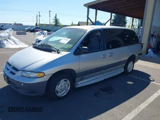 2000 Dodge Caravan SE with VIN 1B4GP44G1YB680819, listed as a IAAI auction lot 42057681 with 23,422 mi miles. Bid and sale history available at carsss.com. Image 2.