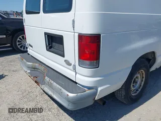 2002 Ford Econoline Cargo with VIN 1FTRE14272HA57164, listed as a IAAI auction lot 42071945 with 236,387 mi miles. Bid and sale history available at carsss.com. Image 13.