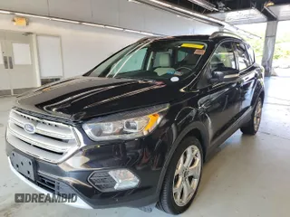 2019 Ford Escape Titanium with VIN 1FMCU9J96KUA01051, listed as a IAAI auction lot 42841649 with 69,720 mi miles and . Bid and sale history available at DreamBid. Image 16.