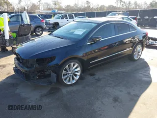 2013 Volkswagen CC VR6 Lux with VIN WVWHU7AN8DE509059, listed as a IAAI auction lot 41402695 with 123,518 mi miles. Bid and sale history available at carsss.com. Image 2.