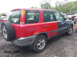 2001 Honda CR-V EX z VIN JHLRD18611C045140, wystawiony jako IAAI lot #42253482 z przebiegiem 142 237 mil mil oraz . Historia ofert i sprzedaży dostępna na DreamBid. Obrazek 4.