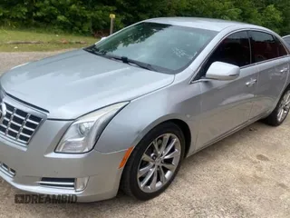 2013 Cadillac XTS Luxury z VIN 2G61P5S33D9171411, wystawiony jako Copart lot #59880945 z przebiegiem 268 029 mil mil oraz Czysty tytuł • Clean title. Historia ofert i sprzedaży dostępna na DreamBid. Obrazek 2.
