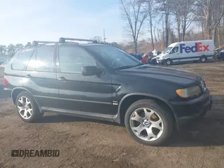 2003 BMW X5 4.4i with VIN 5UXFB33543LH43200, listed as a IAAI auction lot 41652303 with 169,250 mi miles. Bid and sale history available at carsss.com. Image 13.