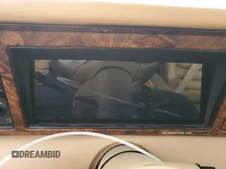 1987 Chrysler LeBaron z VIN 1C3CJ51E1HG137845, wystawiony jako Copart lot #86610254 z przebiegiem Nie podano mil oraz Czysty tytuł • Clean title. Historia ofert i sprzedaży dostępna na DreamBid. Obrazek 9.