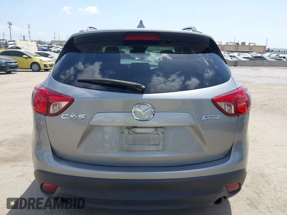 2014 Mazda CX-5 Touring z VIN JM3KE2CYXE0322943, wystawiony jako IAAI lot #41934670 z przebiegiem 110 690 mil mil oraz . Historia ofert i sprzedaży dostępna na DreamBid. Obrazek 16.