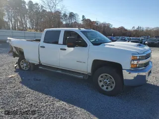 2017 Chevrolet Silverado 3500HD Work Truck with VIN 1GC4KYCY7HF141670, listed as a Copart auction lot 82286874 with 202,697 mi miles and Salvage Title. Bid and sale history available at carsss.com. Image 4.
