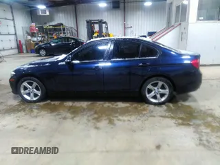 2014 BMW 3 Series 328i xDrive with VIN WBA3B3C57EF545372, listed as a IAAI auction lot 42078980 with 116,627 mi miles and . Bid and sale history available at carsss.com. Image 14.