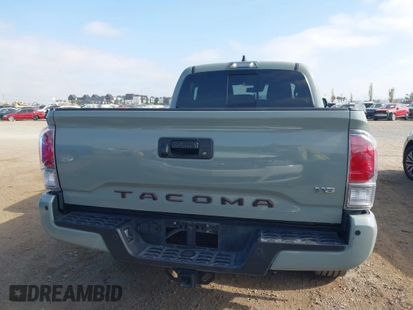 2022 Toyota Tacoma SR5 z VIN 3TMBZ5DN3NM034388, wystawiony jako IAAI lot #42270543 z przebiegiem 179 904 mil mil oraz . Historia ofert i sprzedaży dostępna na DreamBid. Obrazek 16.