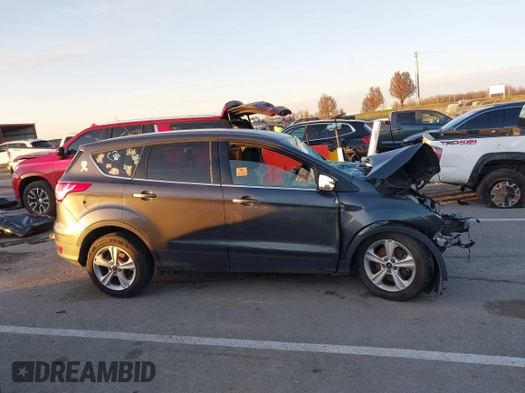 2016 Ford Escape SE with VIN 1FMCU9GX5GUB76100, listed as a IAAI auction lot 41079009 with 1 mi miles. Bid and sale history available at carsss.com. Image 13.