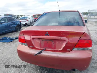 2006 Mitsubishi Lancer ES with VIN JA3AJ26E66U057223, listed as a IAAI auction lot 41665991 with 165,359 mi miles. Bid and sale history available at carsss.com. Image 16.