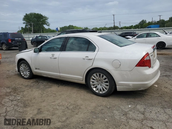 2012 Ford Fusion Hybrid с VIN 3FADP0L35CR184476, выставлен на аукционе Copart как лот 63907885 с пробегом 230 589 миль миль и Списание • Salvage title. История ставок и продаж доступна на DreamBid. Изображение 2.