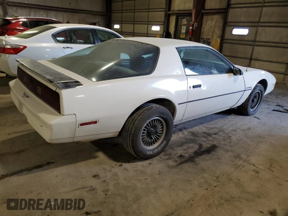 1984 Pontiac Firebird z VIN 1G2AS87H8EL260830, wystawiony jako Copart lot #84198714 z przebiegiem 95 966 mil mil oraz Szkoda całkowita • Salvage title. Historia ofert i sprzedaży dostępna na DreamBid. Obrazek 3.
