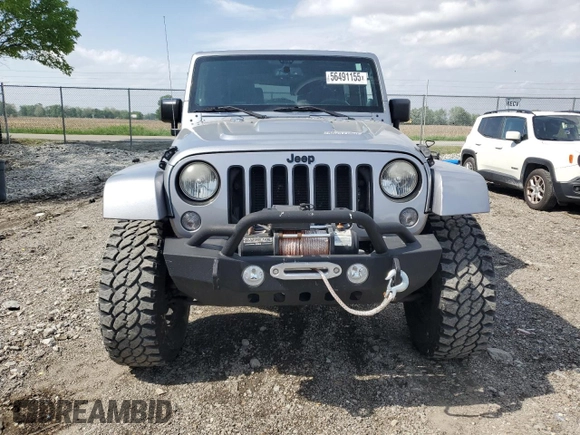 2014 Jeep Wrangler Sahara with VIN 1C4AJWBG0EL241643, listed as a Copart auction lot 56491155 with 113,596 mi miles and Salvage title. Bid and sale history available at DreamBid. Image 5.