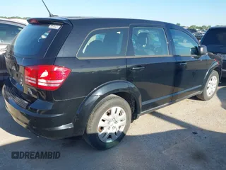 2014 Dodge Journey American Value with VIN 3C4PDCAB8ET310539, listed as a IAAI auction lot 42518244 with 170,906 mi miles and . Bid and sale history available at DreamBid. Image 4.
