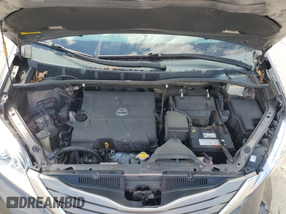 2012 Toyota Sienna XLE AAS with VIN 5TDYK3DCXCS199580, listed as a Copart auction lot 52455405 with 113,259 mi miles and Salvage Title. Bid and sale history available at DreamBid. Image 12.