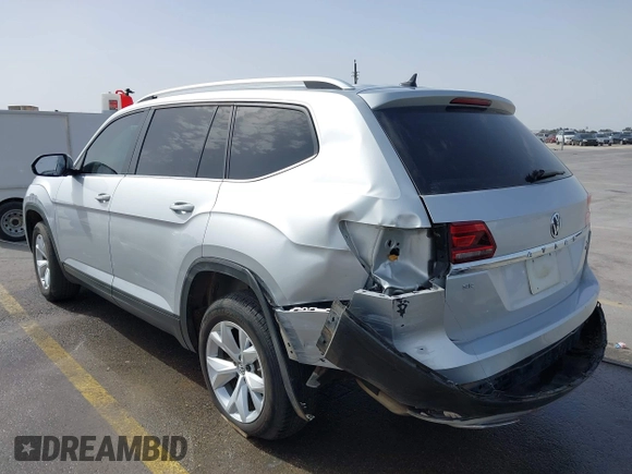 2018 Volkswagen Atlas SE with VIN 1V2KR2CA7JC546436, listed as a IAAI auction lot 41739327 with 123,916 mi miles and . Bid and sale history available at DreamBid. Image 3.