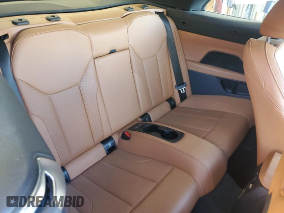 2023 BMW 4 Series 430i z VIN WBA23AT02PCL58336, wystawiony jako Copart lot #50940835 z przebiegiem 22 680 mil mil oraz Szkoda całkowita • Salvage title. Historia ofert i sprzedaży dostępna na DreamBid. Obrazek 10.