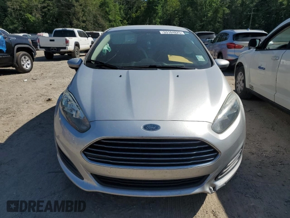 2019 Ford Fiesta SE z VIN 3FADP4BJXKM123806, wystawiony jako Copart lot #53184825 z przebiegiem 141 759 mil mil oraz Szkoda całkowita • Salvage title. Historia ofert i sprzedaży dostępna na DreamBid. Obrazek 5.