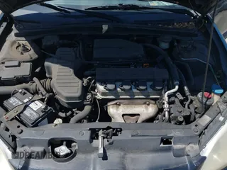 2005 Honda Civic Cpe LX with VIN 1HGEM22555L067506, listed as a IAAI auction lot 42149359 with 204,616 mi miles. Bid and sale history available at carsss.com. Image 10.