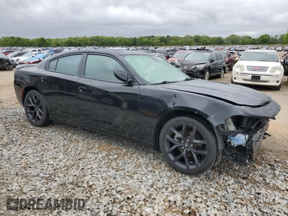 2021 Dodge Charger SXT with VIN 2C3CDXBG6MH613055, listed as a Copart auction lot 52149655 with 86,396 mi miles and Salvage Title. Bid and sale history available at carsss.com. Image 4.