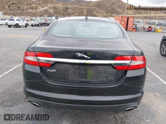 2013 Jaguar XF I4 RWD with VIN SAJWA0ES0DPS64027, listed as a IAAI auction lot 41569121 with 103,115 mi miles. Bid and sale history available at carsss.com. Image 16.