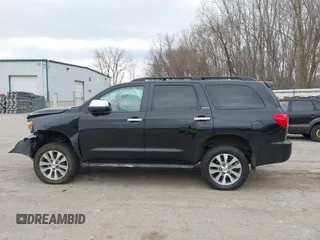 2016 Toyota Sequoia Limited with VIN 5TDJY5G14GS143565, listed as a IAAI auction lot 41823068 with 144,566 mi miles. Bid and sale history available at carsss.com. Image 14.