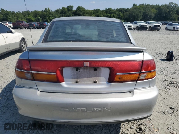 2002 Saturn LS z VIN 1G8JW54RX2Y510735, wystawiony jako Copart lot #67517484 z przebiegiem 272 600 mil mil oraz Szkody całkowita. Historia ofert i sprzedaży dostępna na DreamBid. Obrazek 6.