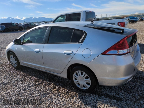 2010 Honda Insight LX with VIN JHMZE2H51AS011243, listed as a Copart auction lot 54445555 with 224,722 mi miles and Salvage Title. Bid and sale history available at DreamBid. Image 2.