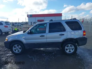 2007 Ford Escape XLT with VIN 1FMYU03Z37KA92572, listed as a IAAI auction lot 41213281 with 129,366 mi miles. Bid and sale history available at carsss.com. Image 14.
