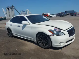 2012 Infiniti M with VIN JN1BY1AR7CM395167, listed as a IAAI auction lot 42587395 with 117,415 mi miles and . Bid and sale history available at DreamBid. Image 1.
