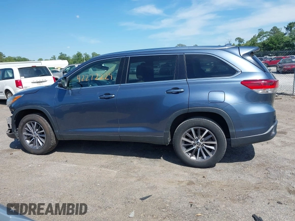 2019 Toyota Highlander SE with VIN 5TDKZRFH1KS290412, listed as a IAAI auction lot 42272229 with 74,212 mi miles and . Bid and sale history available at DreamBid. Image 15.