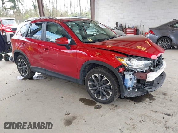 2016 Mazda CX-5 Grand Touring with VIN JM3KE4DY3G0688062, listed as a IAAI auction lot 42025169 with 59,867 mi miles and . Bid and sale history available at carsss.com. Image 1.