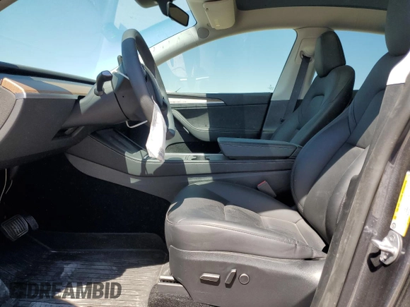 2023 Tesla Model Y Long Range z VIN 7SAYGDEE8PA185193, wystawiony jako Copart lot #48706215 z przebiegiem 10 451 mil mil oraz Szkoda całkowita • Salvage title. Historia ofert i sprzedaży dostępna na DreamBid. Obrazek 7.