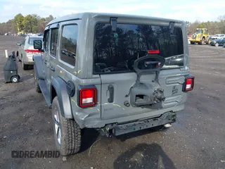 2021 Jeep Wrangler Unlimited Willys Sport with VIN 1C4HJXDGXMW767633, listed as a IAAI auction lot 41700168 with 37,994 mi miles and . Bid and sale history available at DreamBid. Image 6.